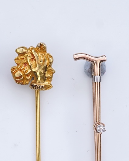 A collection of four tie pins, circa 1900